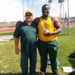 Eldred Henry, right, with his Central Arizona College Coach Tony Dougherty after shattering the school record.  Photo: Provided