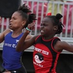A'Keela McMaster, left and Jahtivya Williams fight to the line in the U11 Girls 150m which McMaster win in 21.12-21.21 over Williams. Photo: Dean "The Sportsman" Greenaway
