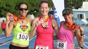 USVI's Ruth Ann David, left, established a new course record and was followed by the BVI's Kartina Crumpler and Virgin Gorda resident, Kim Takeuchi Photo: Dean "The Sportsman" Greenaway