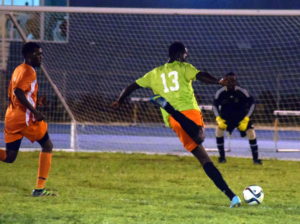 Andre Thomas shoots and scores to give One Love a surprise 1-0 win over the Sugar Boyz. Photo: BVIFA