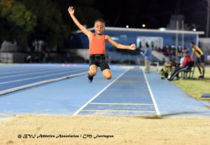 Latriel Williams leaps a distance of 3.43m in the Boys' U11 Long Jump. Photo: BVI Athletics Association