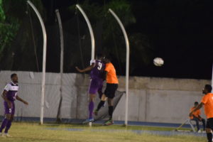 Kevin Fisher gets his head to the ball for the Islanders against Sugar Boys. Photo: BVIFA